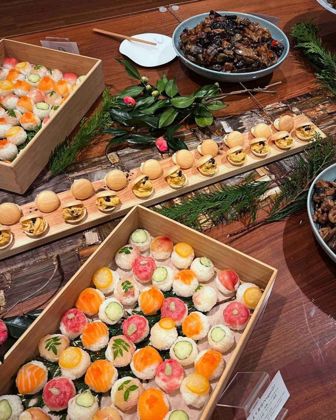 Seasonal finger food presented in wooden catering boxes